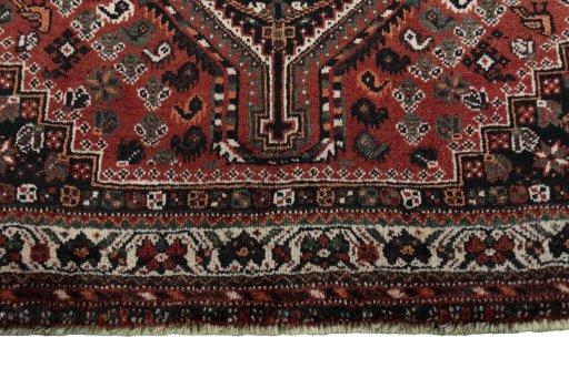 Central medallion detail of 2000s Shiraz rug from Iran / Persia