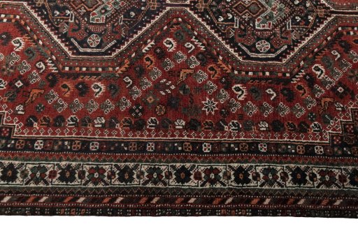 Close-up detail of 2000s Shiraz rug from Iran / Persia showing Wool weave