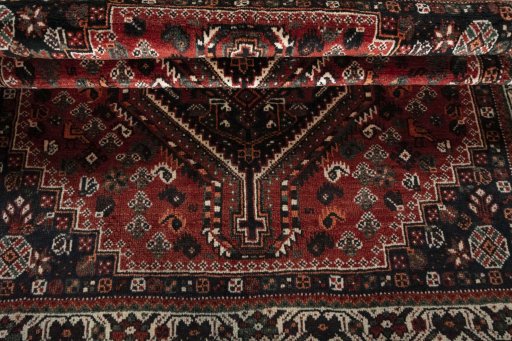 Full view of 2000s Shiraz rug from Iran / Persia, 207 × 159 cm in Red tones