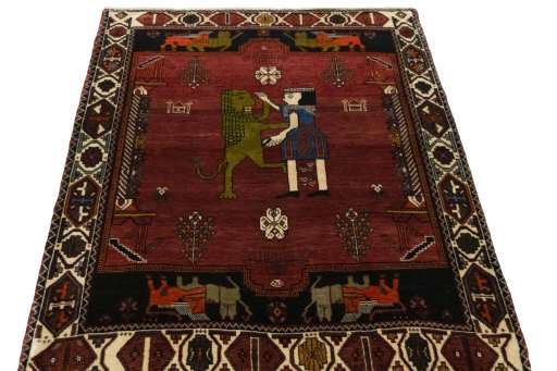 Surface texture of 2000s Shiraz rug with natural Wool and intricate pattern