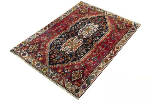 Corner detail of 2000s Shiraz rug showing border pattern and Wool pile
