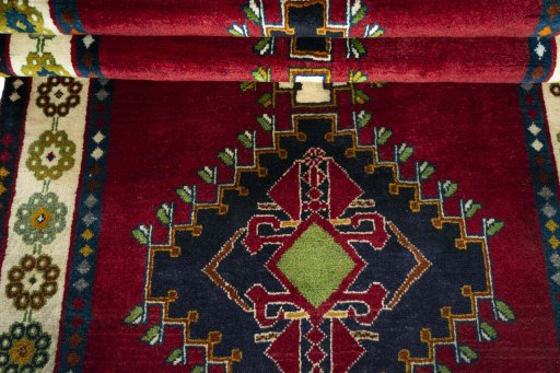 Full view of 2000s Shiraz rug from Iran / Persia, 230 × 114 cm in Red tones