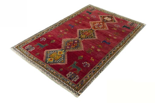 Corner detail of 2000s Shiraz rug showing border pattern and Wool pile