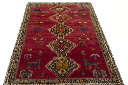 Surface texture of 2000s Shiraz rug with natural Wool and intricate pattern