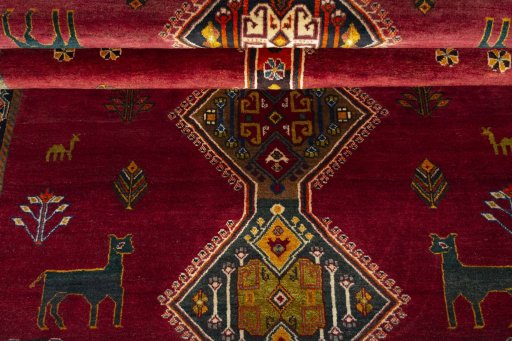 Full view of 2000s Shiraz rug from Iran / Persia, 233 × 153 cm in Red tones