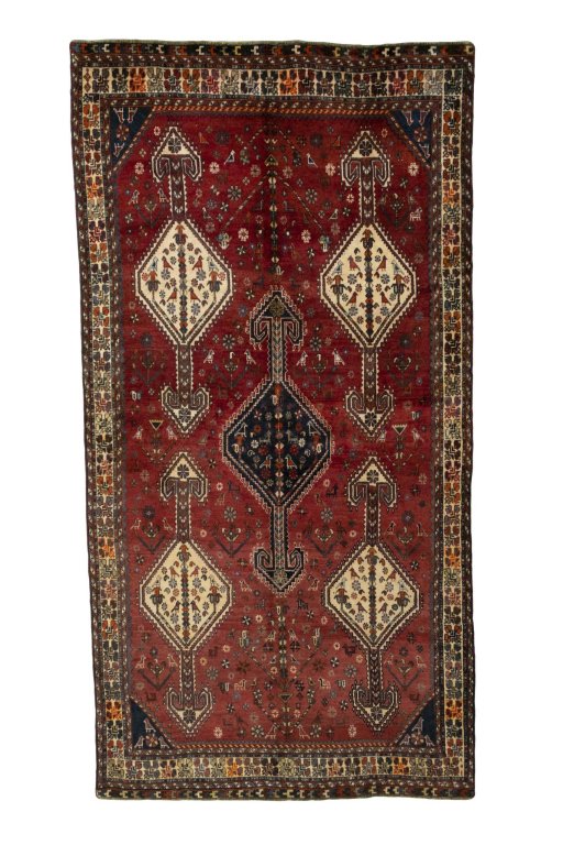 Full view of 1970s Shiraz rug from Iran / Persia, 300 × 155 cm in Red tones