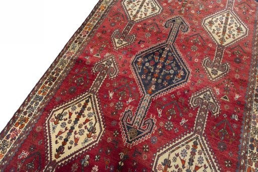 Backside of handmade 1970s Shiraz rug showing knot structure and weave density