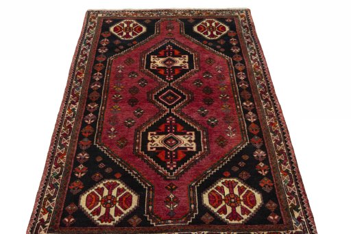 Surface texture of 2000s Shiraz rug with natural Wool and intricate pattern
