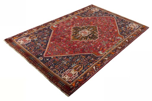 Corner detail of 2000s Shiraz rug showing border pattern and Wool pile