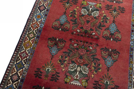 Backside of handmade 2000s Shiraz rug showing knot structure and weave density