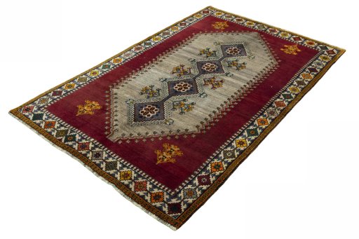 Corner detail of 2000s Shiraz rug showing border pattern and Wool pile