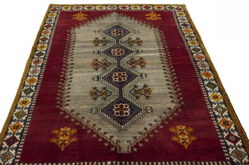 Surface texture of 2000s Shiraz rug with natural Wool and intricate pattern