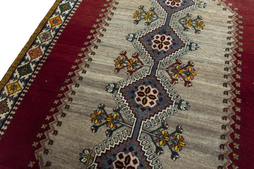 Backside of handmade 2000s Shiraz rug showing knot structure and weave density
