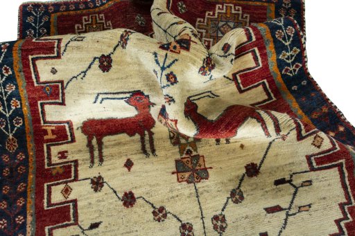 Corner detail of 2000s Shiraz rug showing border pattern and Wool pile