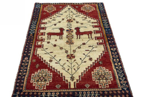 Surface texture of 2000s Shiraz rug with natural Wool and intricate pattern