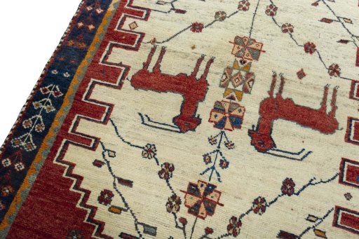 Backside of handmade 2000s Shiraz rug showing knot structure and weave density
