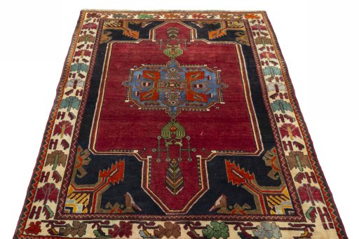 Surface texture of 2000s Shiraz rug with natural Wool and intricate pattern