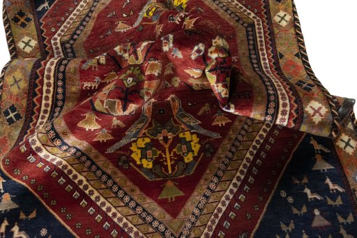 Corner detail of 2000s Shiraz rug showing border pattern and Wool pile