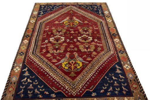 Surface texture of 2000s Shiraz rug with natural Wool and intricate pattern