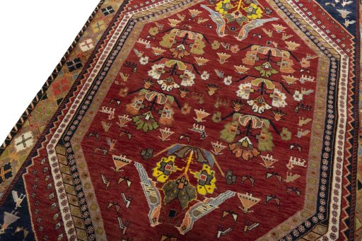 Backside of handmade 2000s Shiraz rug showing knot structure and weave density