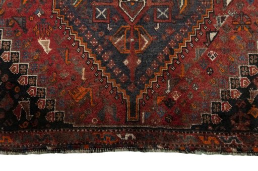 Central medallion detail of 2000s Shiraz rug from Iran / Persia
