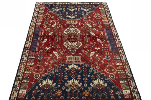 Surface texture of 2000s Shiraz rug with natural Wool and intricate pattern