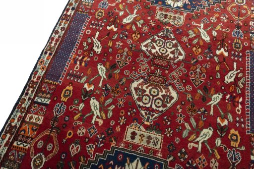 Backside of handmade 2000s Shiraz rug showing knot structure and weave density