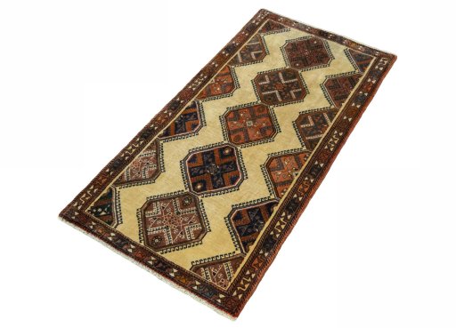 Corner detail of 2000s Shiraz rug showing border pattern and Wool pile