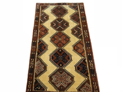 Surface texture of 2000s Shiraz rug with natural Wool and intricate pattern