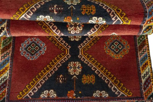 Full view of 2000s Shiraz rug from Iran / Persia, 188 × 84 cm in Red tones