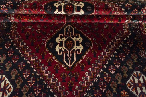 Close-up detail of 2000s Shiraz rug from Iran / Persia showing Wool weave