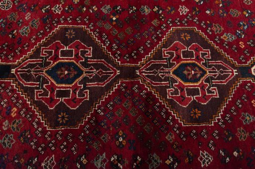 Central medallion detail of 2000s Shiraz rug from Iran / Persia