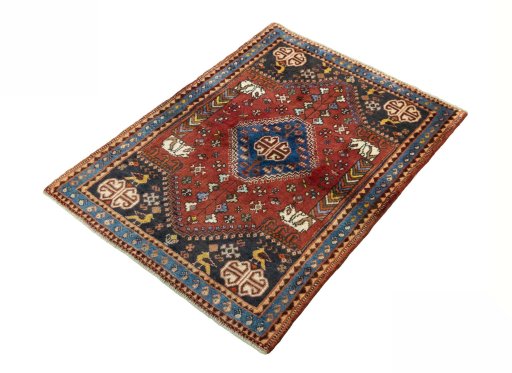 Corner detail of 2000s Shiraz rug showing border pattern and Wool pile