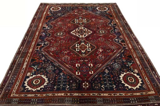 Surface texture of 2000s Shiraz rug with natural Wool and intricate pattern
