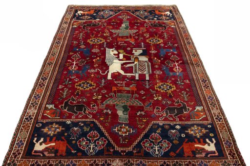 Surface texture of 2000s Shiraz rug with natural Wool and intricate pattern
