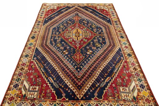 Surface texture of 2000s Shiraz rug with natural Wool and intricate pattern