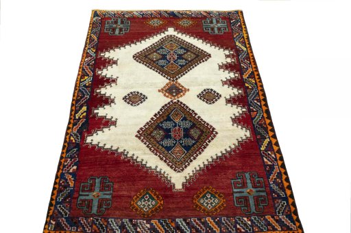 Surface texture of 2000s Shiraz rug with natural Wool and intricate pattern