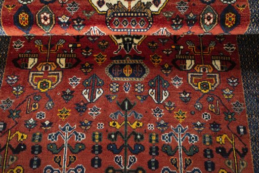Full view of 2000s Shiraz rug from Iran / Persia, 202 × 132 cm in Red tones