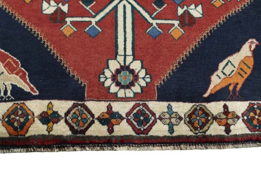 Central medallion detail of 2000s Shiraz rug from Iran / Persia