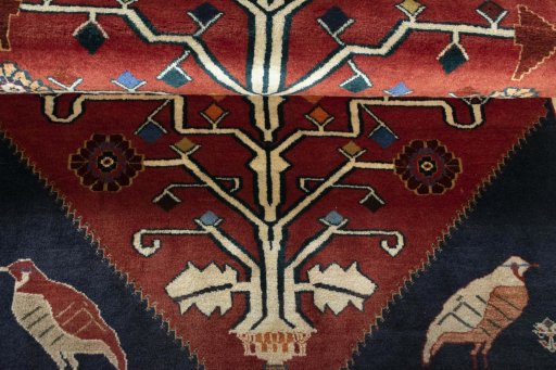 Full view of 2000s Shiraz rug from Iran / Persia, 180 × 128 cm in Red tones