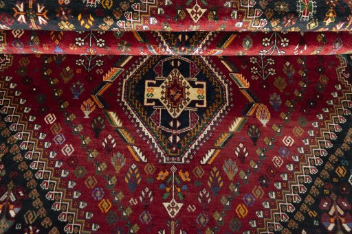 Full view of 2000s Shiraz rug from Iran / Persia, 259 × 172 cm in Red tones