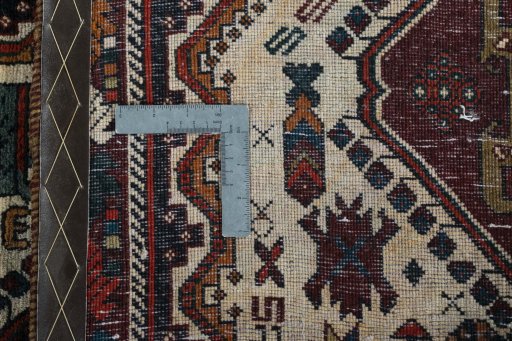 Surface texture of 2000s Shiraz rug with natural Wool and intricate pattern