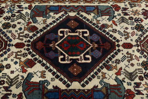 Central medallion detail of 2000s Shiraz rug from Iran / Persia