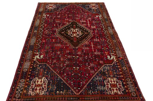 Surface texture of 2000s Shiraz rug with natural Wool and intricate pattern