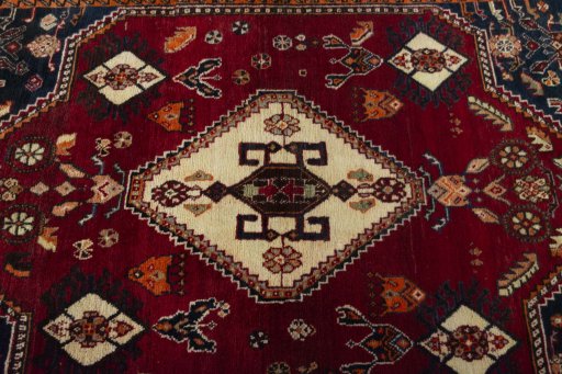Central medallion detail of 2000s Shiraz rug from Iran / Persia