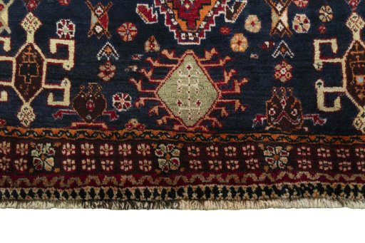 Close-up detail of 2000s Shiraz rug from Iran / Persia showing Wool weave