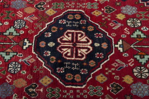 Central medallion detail of 2000s Shiraz rug from Iran / Persia