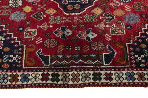Full view of 2000s Shiraz rug from Iran / Persia, 146 × 105 cm in Red tones
