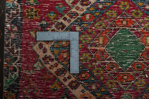 Backside of handmade Unknown Shiraz rug showing knot structure and weave density