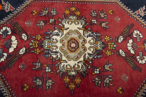 Central medallion detail of 2000s Shiraz rug from Iran / Persia